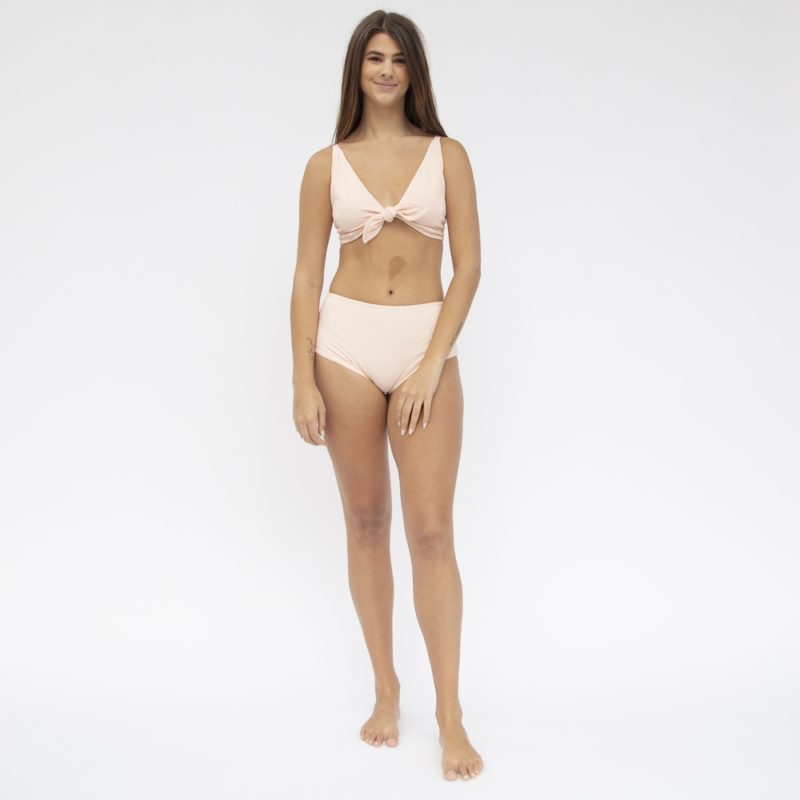 Front shot of straight size model in Tear Drop Tie Top and Hipster Bottoms in Petal Pink Rib.