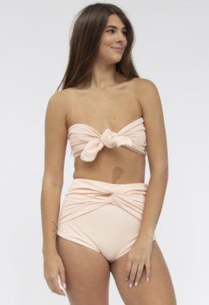 Front shot of straight size model in Bandeau Tie Top Top and Twist High-Waisted Bottoms in Petal Pink Rib.