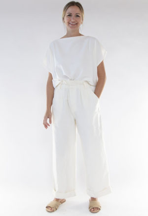 Front view of straight size model wearing Ivory Rib Cropped Rib Boatneck Top.