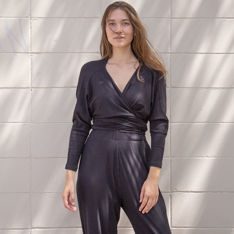 Front view of straight size model wearing Black Rib Everything Top.