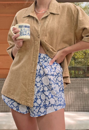Front view of straight size model wearing Blue & White Floral Short Shorts.