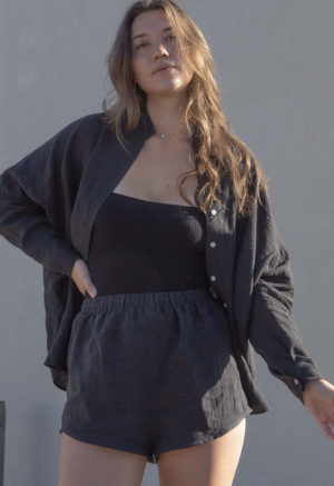 Front view of straight size model wearing Black Linen Short Shorts.