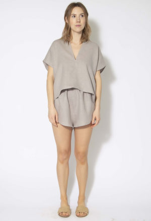 Front view of straight size model wearing Pebble Gray Double V Cropped Top.