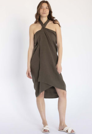 woman in dark green wrap beach cover-up