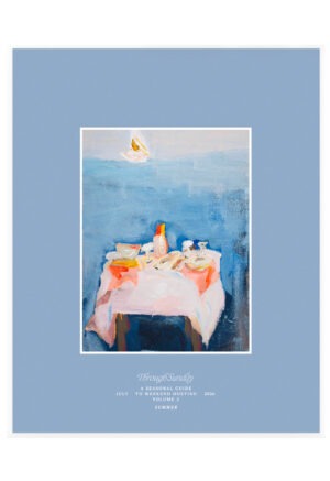 light blue cover of magazine with painting of table in water