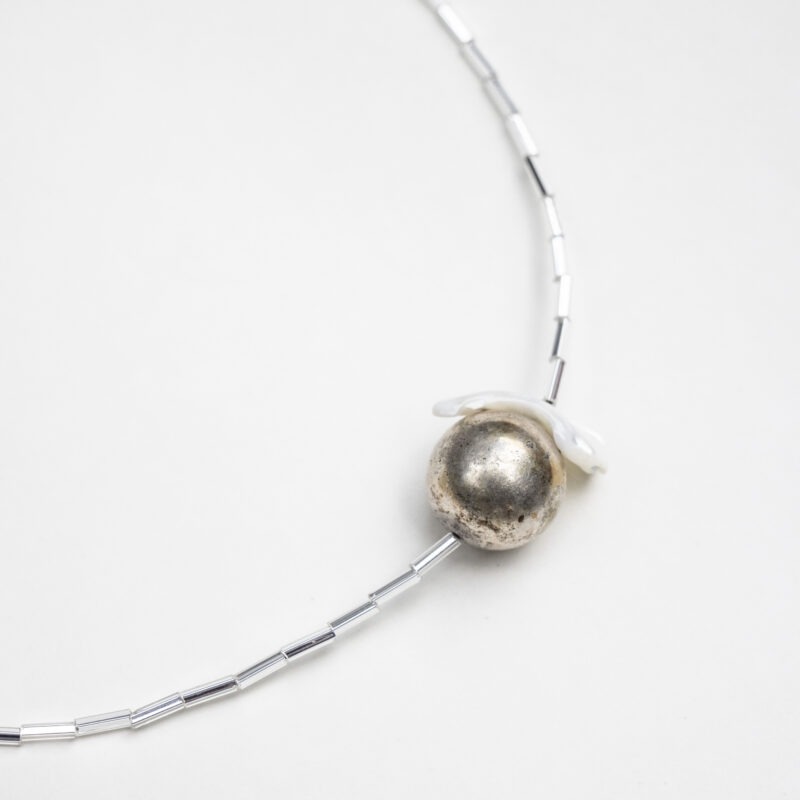 necklace on white backdrop