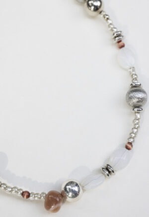 Necklace of silver, white rocks and red rocks