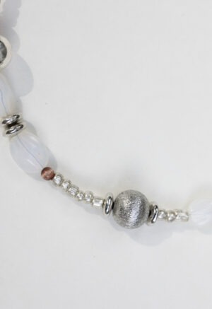 Necklace of silver, white rocks and red rocks