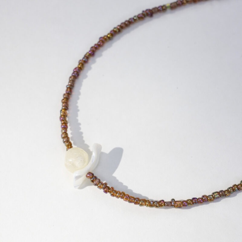 brown and white shell necklace