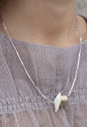 woman wearing necklace