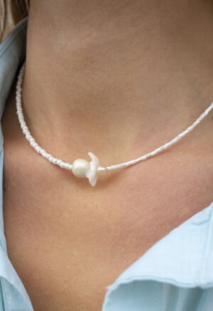 woman wearing pearl necklace
