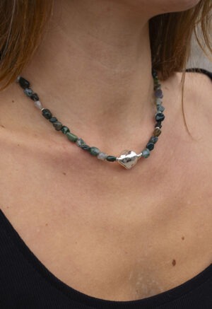 green rock bead necklace on woman