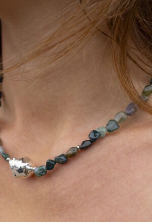 green rock bead necklace on woman