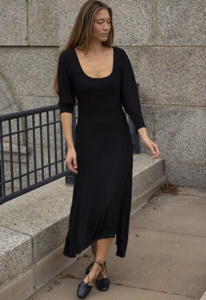 woman in black scoop midi dress
