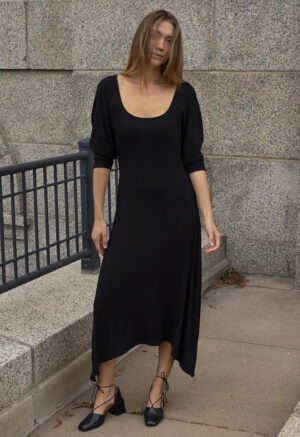 woman in black scoop midi dress