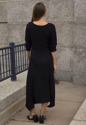 woman in black scoop midi dress