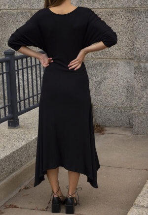 woman in black scoop midi dress