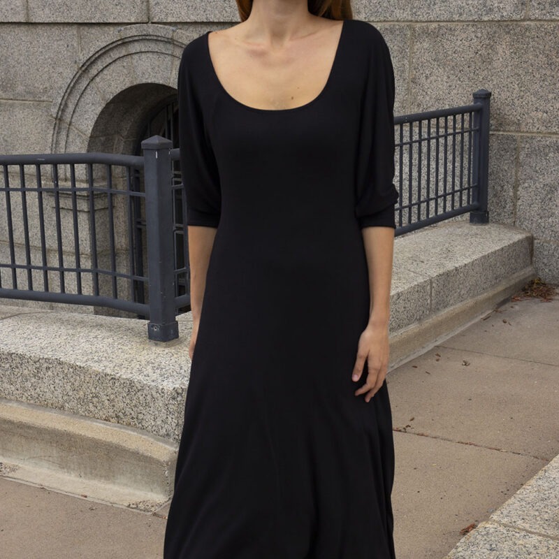 woman in black scoop midi dress