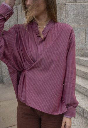 woman in red button-up wrap top