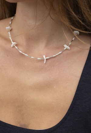 woman wearing necklace