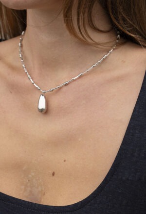 woman wearing necklace