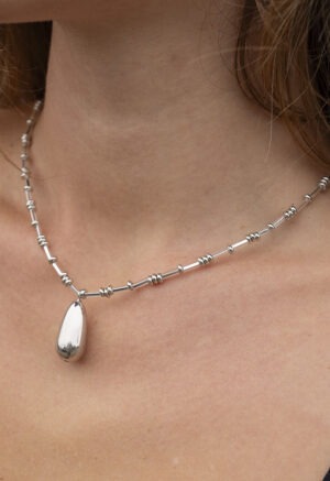 woman wearing necklace