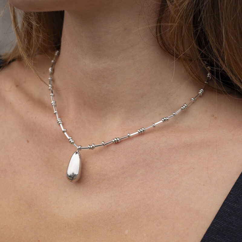 woman wearing necklace