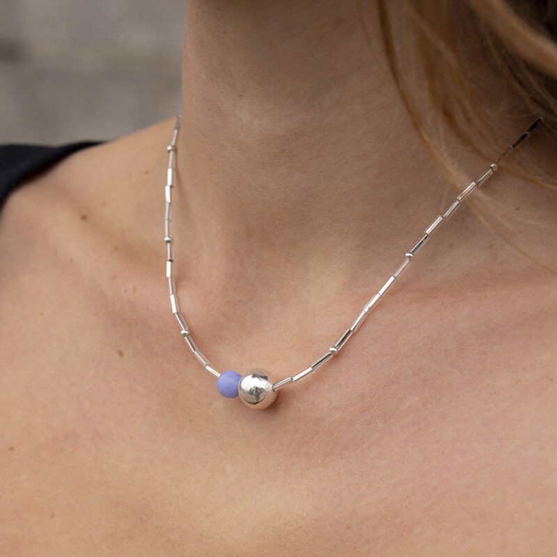 woman wearing necklace